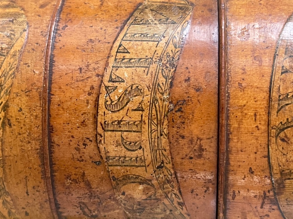 A tall, lathe-turned wooden six-tier cylindrical spice tower featuring original paper labels on each section. View III