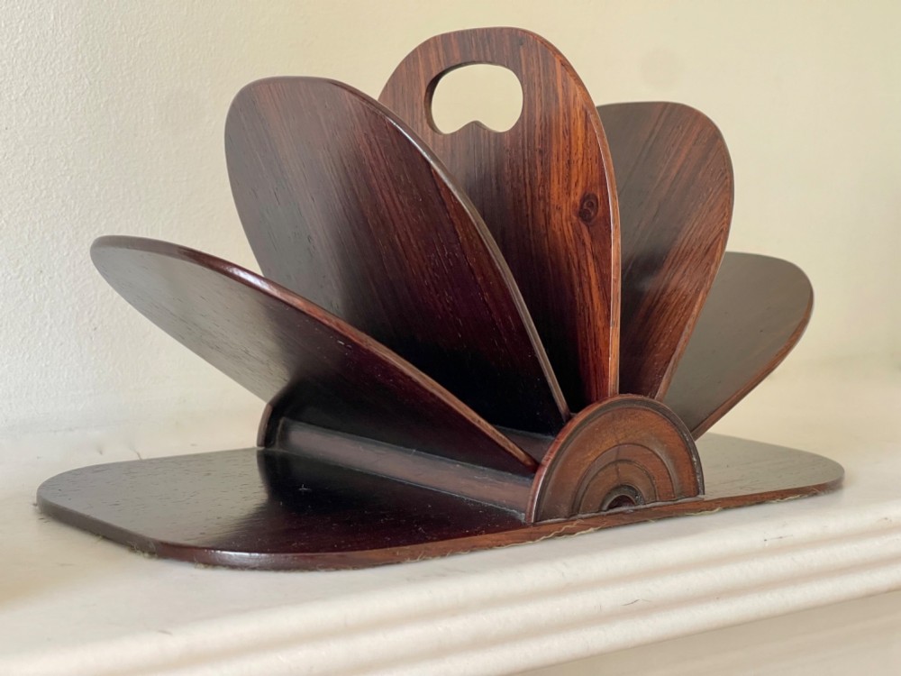 A dark rosewood Regency letter rack featuring a fan-shaped arrangement of tiered dividers mounted on a flat rectangular base with rounded corners. View IV