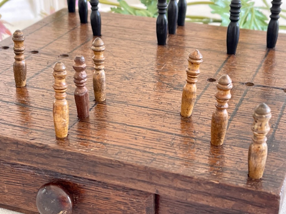 An Antique Nine Men's Morris Game - complete with pegs, drawer for storage View III