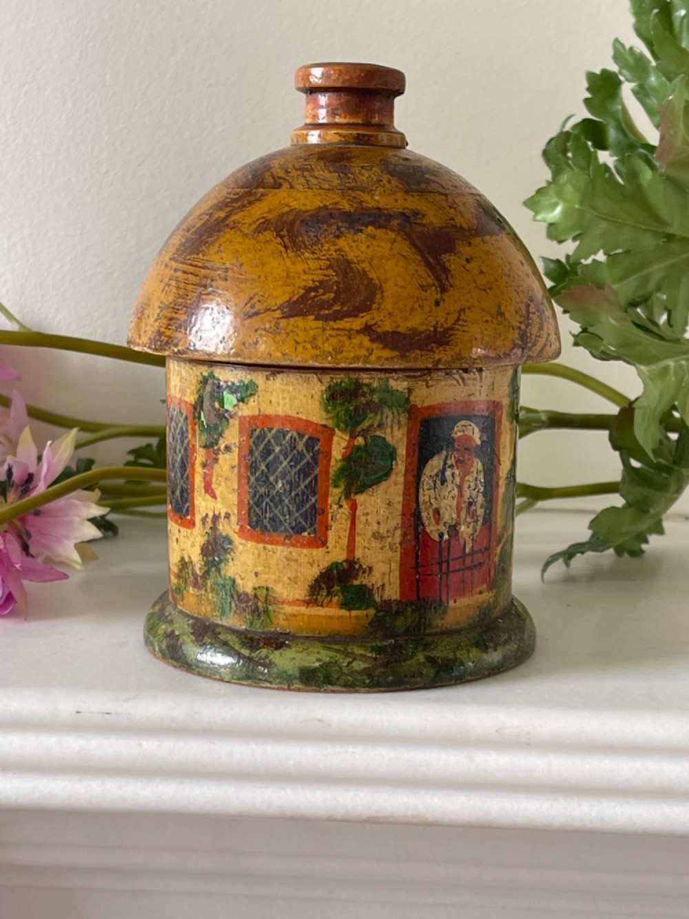 An Antique Cottage Money Box