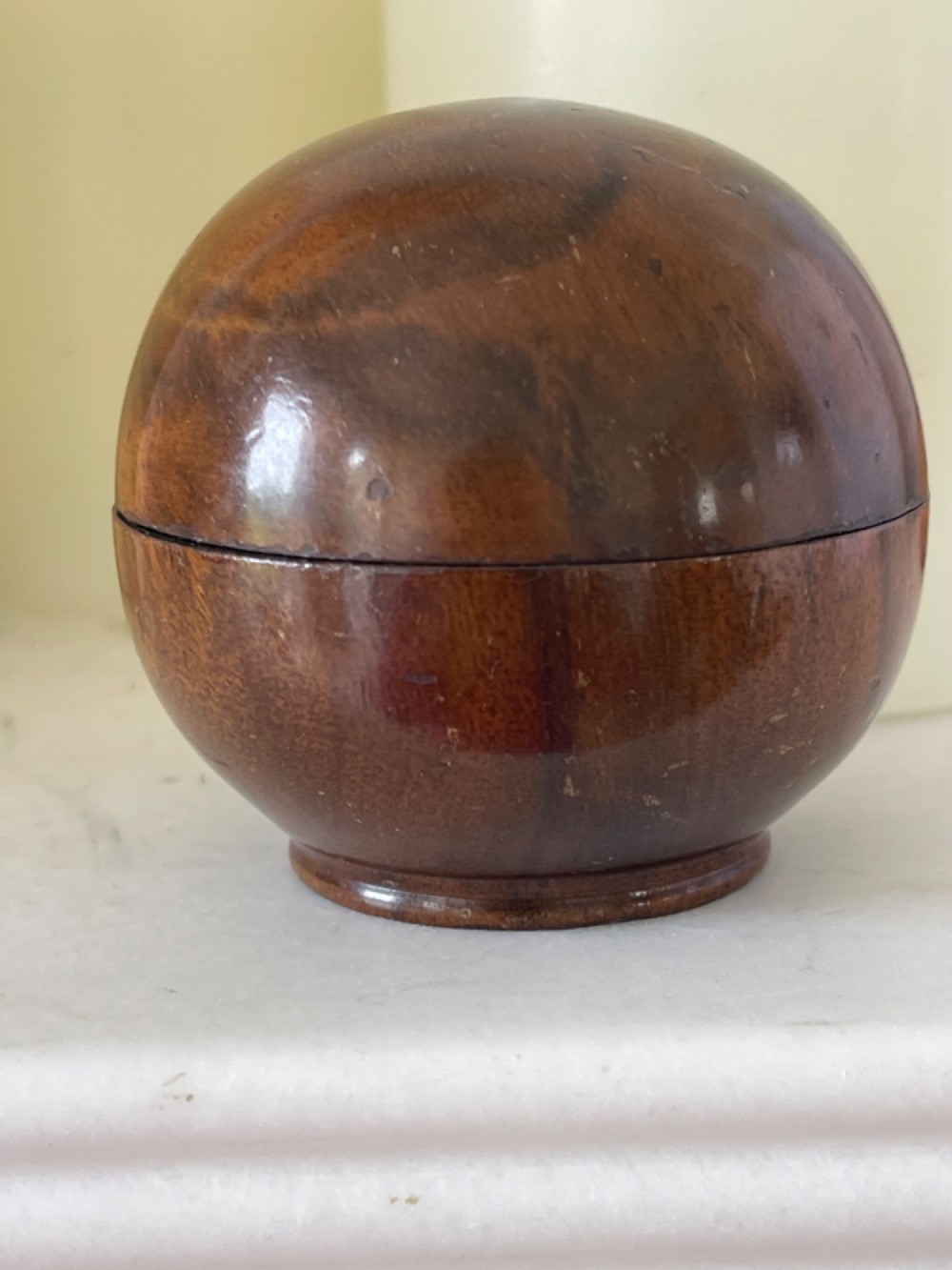 A Small Antique Treen Pill Silverer