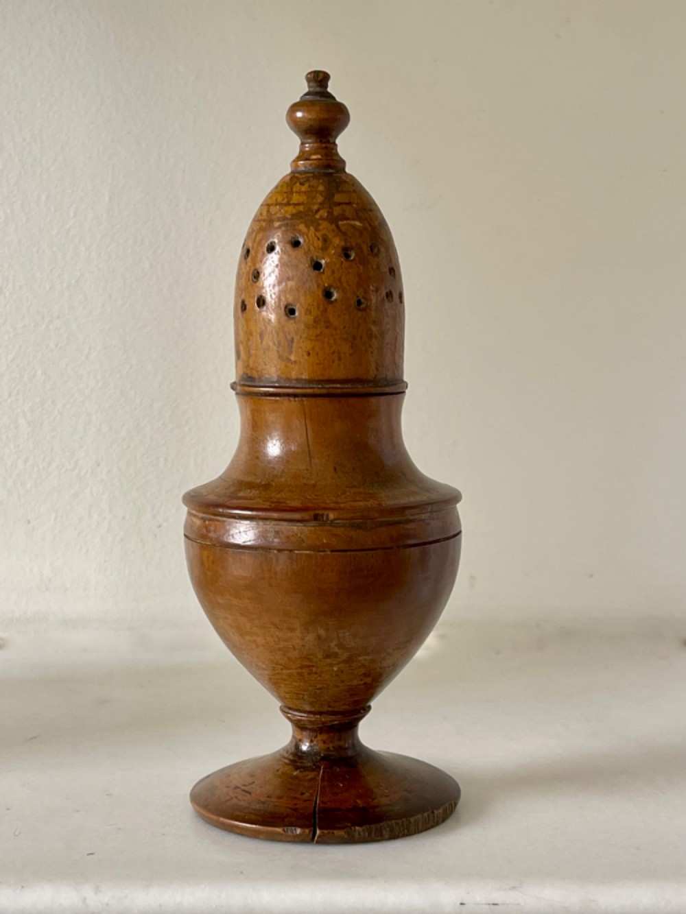 An Antique Treen Spice Muffineer