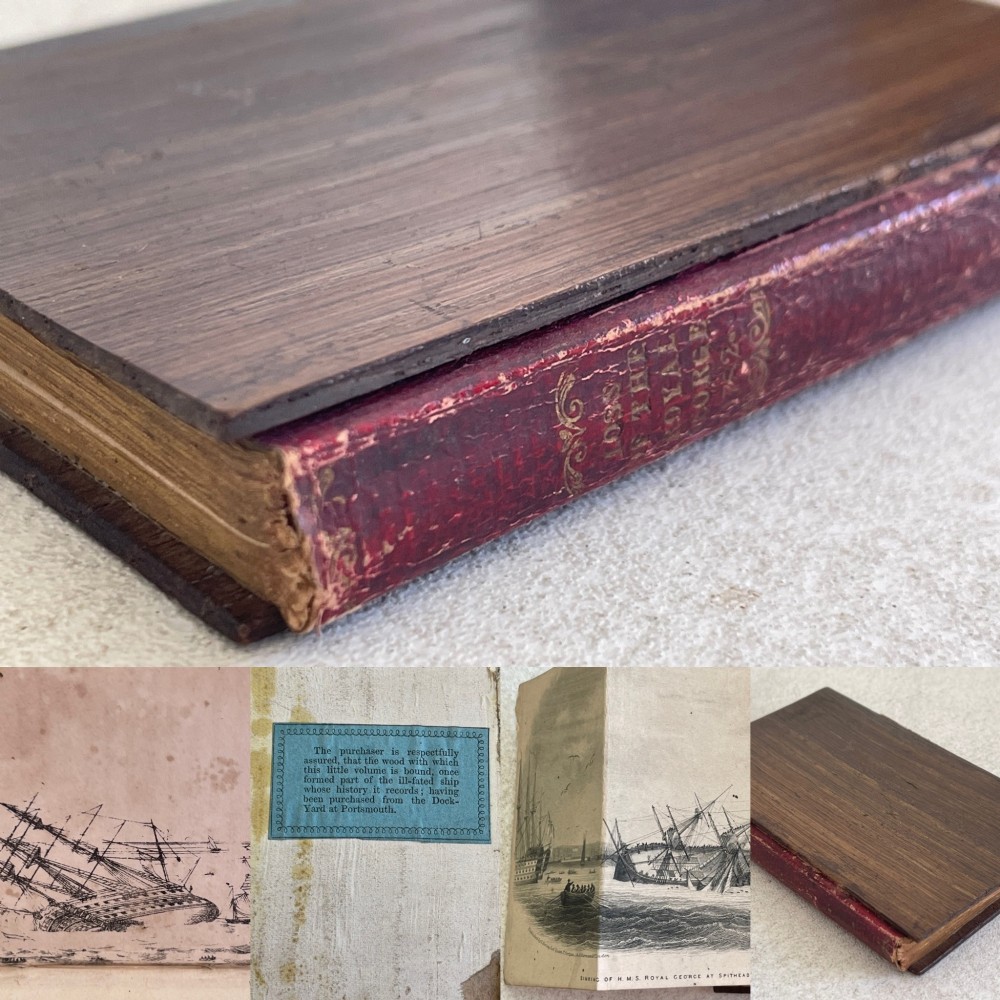 An antique small volume bound with dark wooden board covers, a worn red spine with gilt lettering, and internal pages with printed maritime engravings.