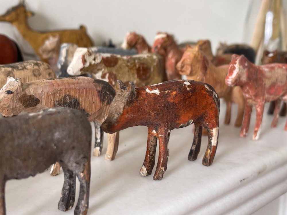 A hand-painted 19th-century wooden Noahs ark toy with a pitched roof and painted windows, accompanied by carved wooden figures. View VIII