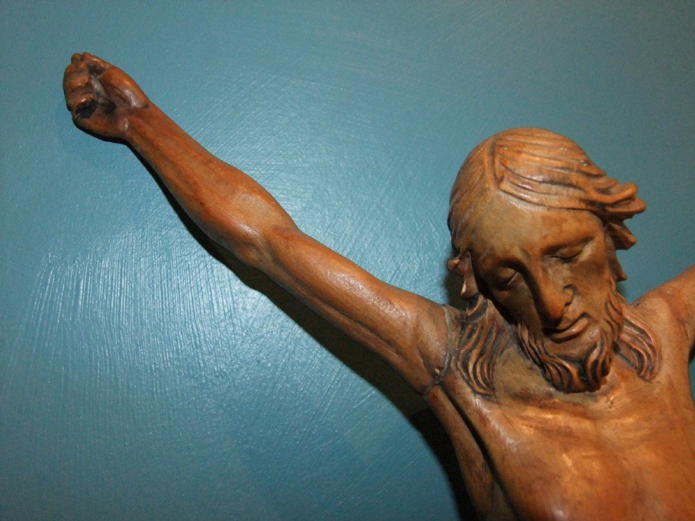 An 18th-century carved fruitwood figure of Corpus Christi showing anatomical detail and draped loincloth against a plain background. View IV