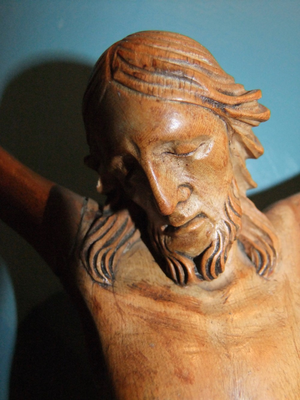 An 18th-century carved fruitwood figure of Corpus Christi showing anatomical detail and draped loincloth against a plain background. View VII