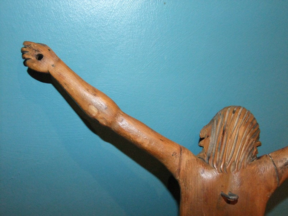 An 18th-century carved fruitwood figure of Corpus Christi showing anatomical detail and draped loincloth against a plain background. View XVI
