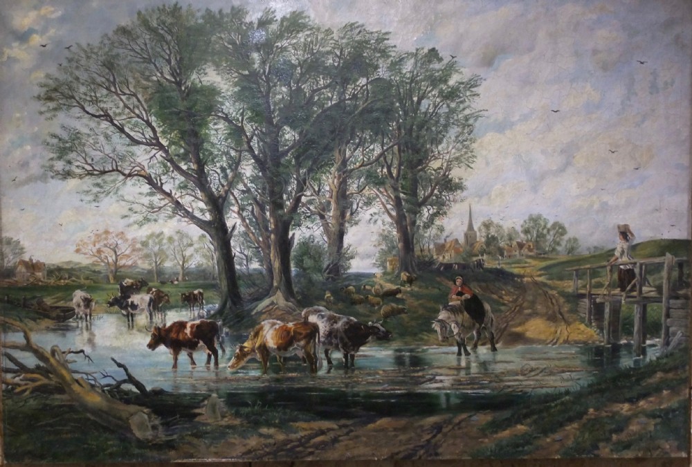 A large 19th-century oil painting depicting cattle drinking at a shallow river ford beneath tall mature trees near a distant village.