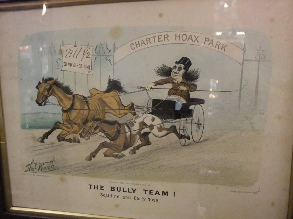 A framed 1882 lithograph by Thomas Worth depicting a caricature of a horse race with a driver in a cart passing through Charter Hoax Park.