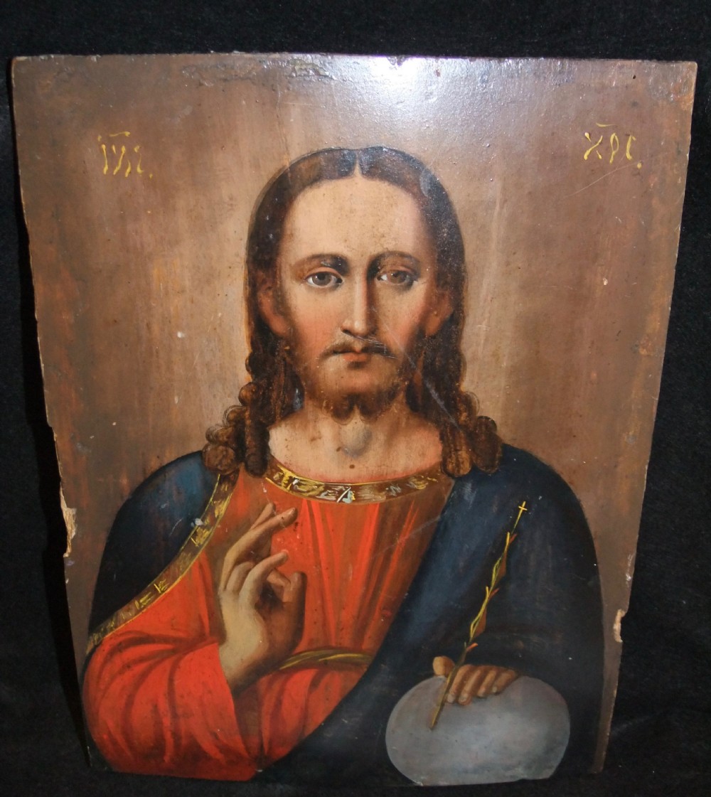 A nineteenth-century Russian Orthodox icon painted on a wooden panel depicting Christ Pantocrator with a raised right hand.