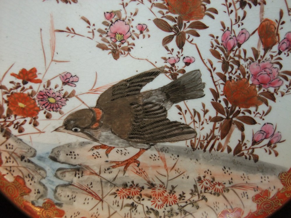 A pair of circular Japanese Kutani porcelain plates decorated with hand-painted sparrows, floral branches, and iron-red gilt borders. View III