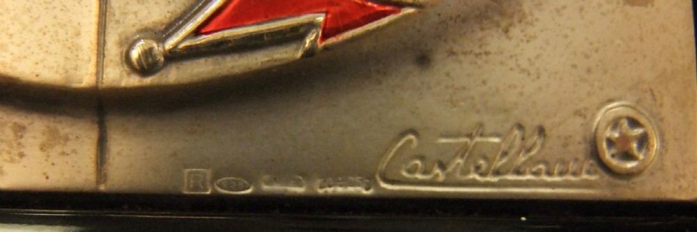 A rectangular black lacquer box featuring an inset silver and enamel lid panel depicting playing card faces and suit motifs. View VIII