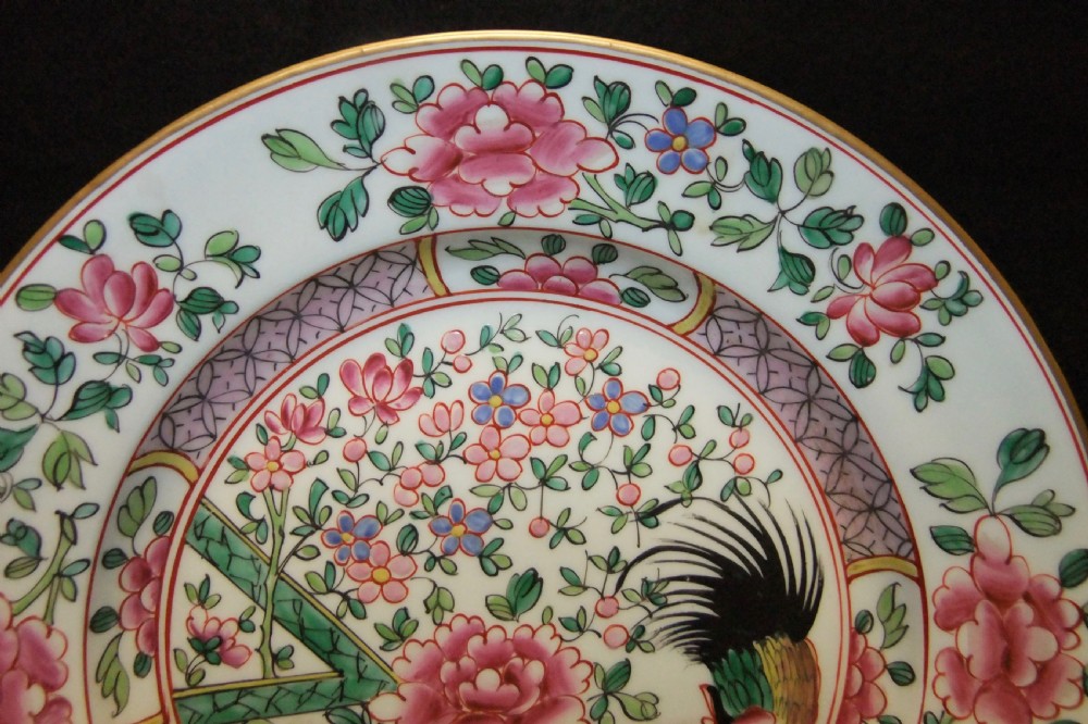 A pair of circular Chinese export porcelain plates decorated with hand-painted roosters, peonies, and pink and green floral borders. View XI
