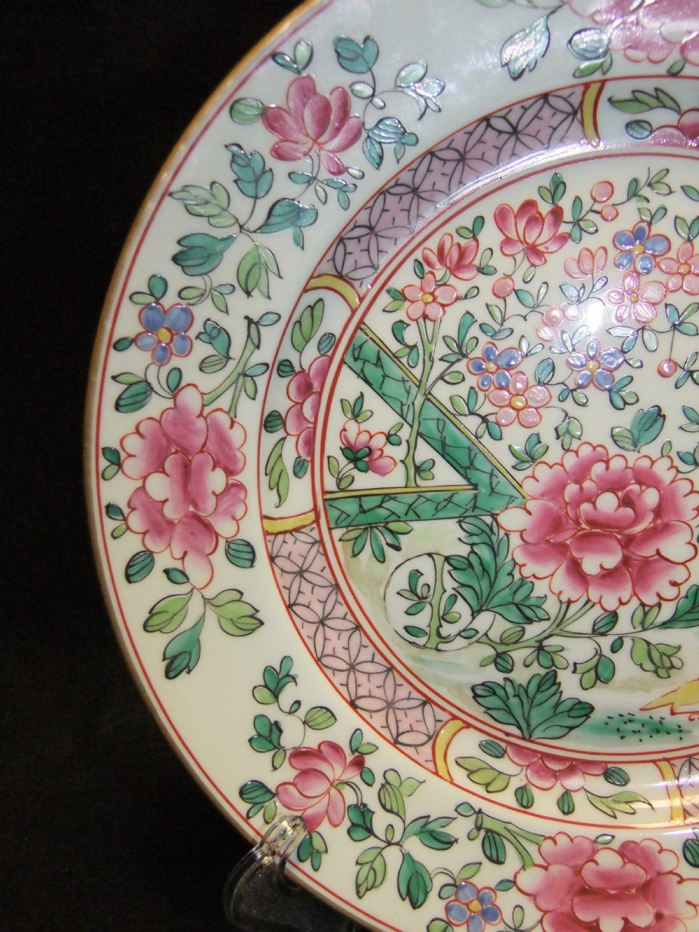 A pair of circular Chinese export porcelain plates decorated with hand-painted roosters, peonies, and pink and green floral borders. View XIV