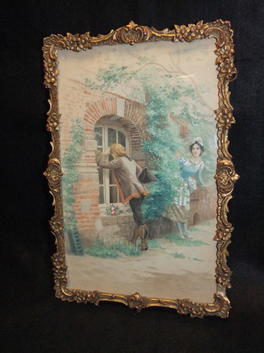 A pair of nineteenth-century watercolour paintings depicting figures in historic attire outside brick buildings, framed in ornate gilt floral frames. View II