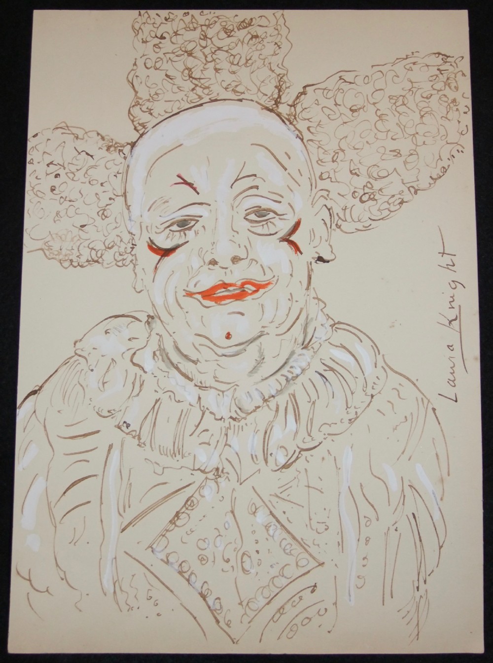 A watercolour, gouache, and pencil portrait sketch on cream paper depicting a seated clown wearing a ruffled collar and makeup, signed Laura Knight on the right side.