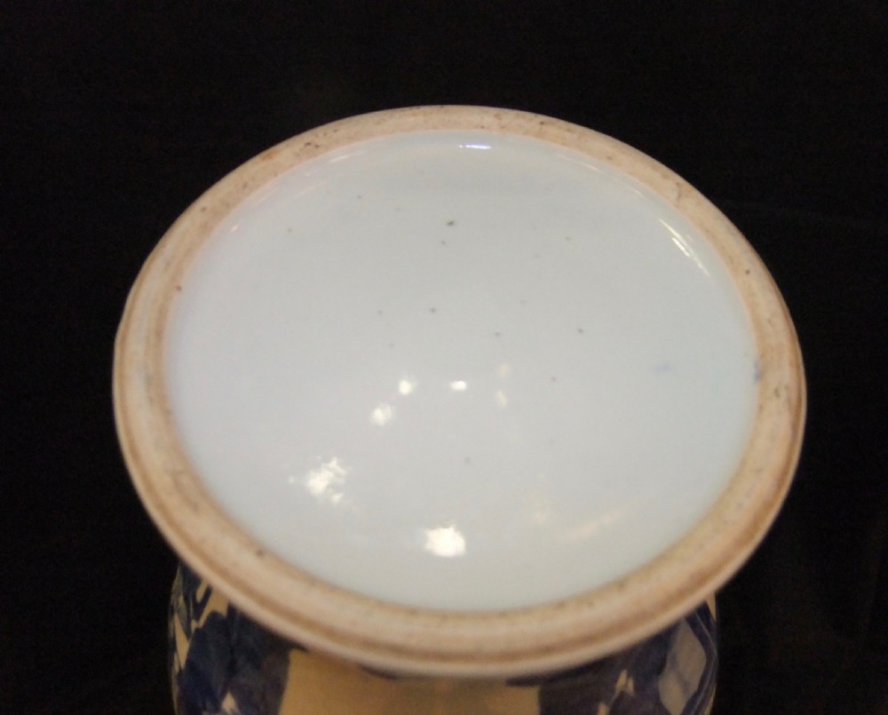 An antique Chinese blue and white porcelain Yen Yen vase featuring a flared trumpet rim and narrative figurative panels painted in underglaze cobalt blue. View VII
