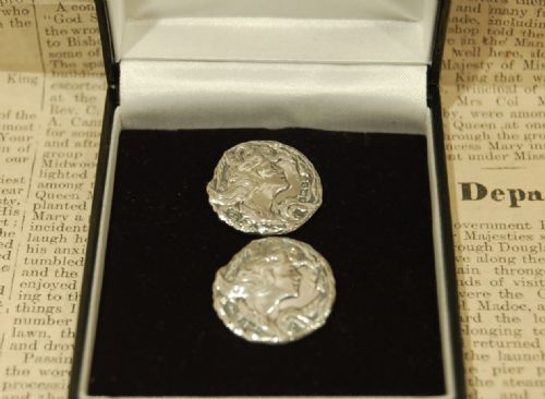 Pair of Art Nouveau Silver Buttons