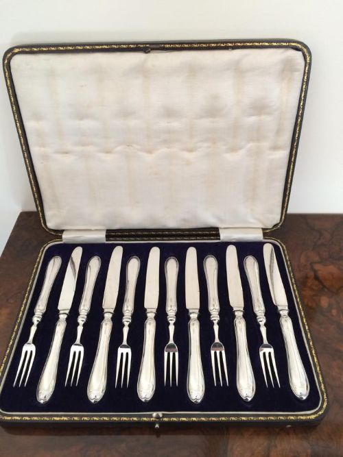 Set of George V Silver Dessert Knives and Forks