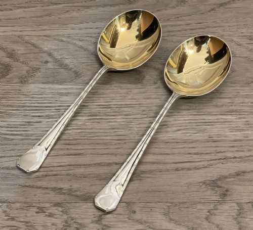 fig 1. Pair Arts & Crafts Silver Serving Spoons, Hallmarked Sheffield by Lee & Wigfull. Registered Design number dated 1905