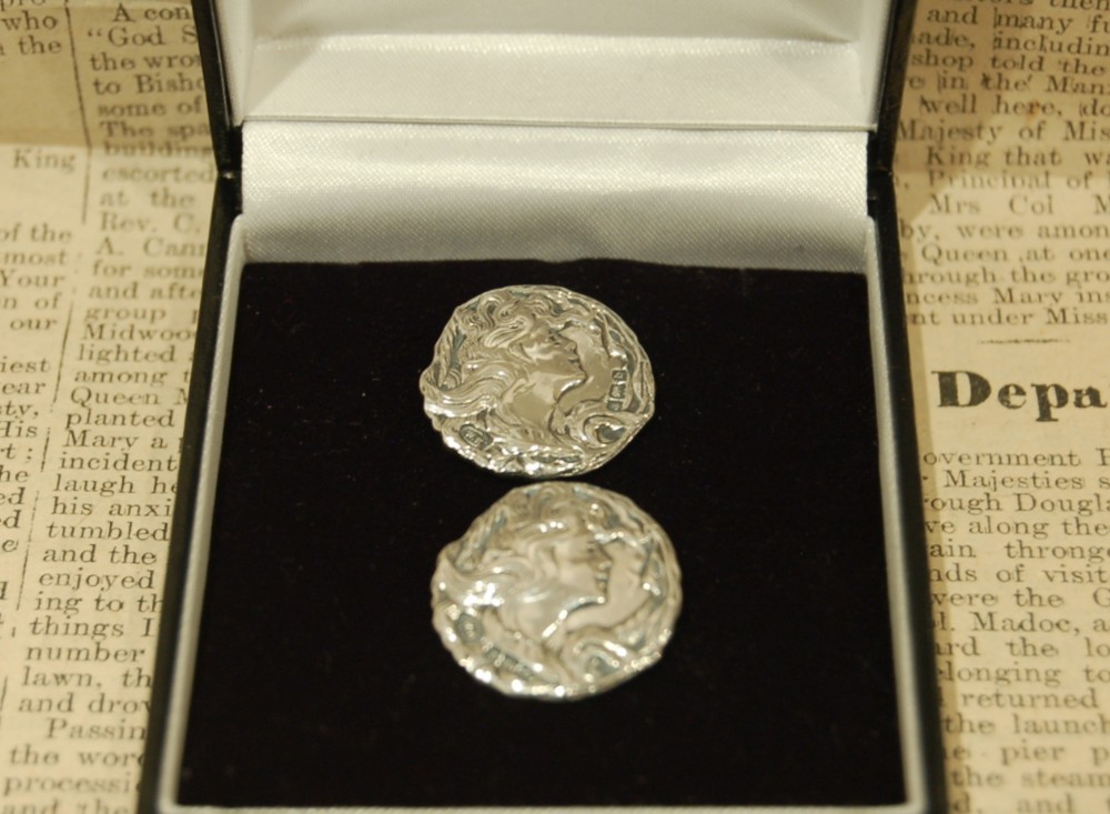 Pair of Art Nouveau Silver Buttons