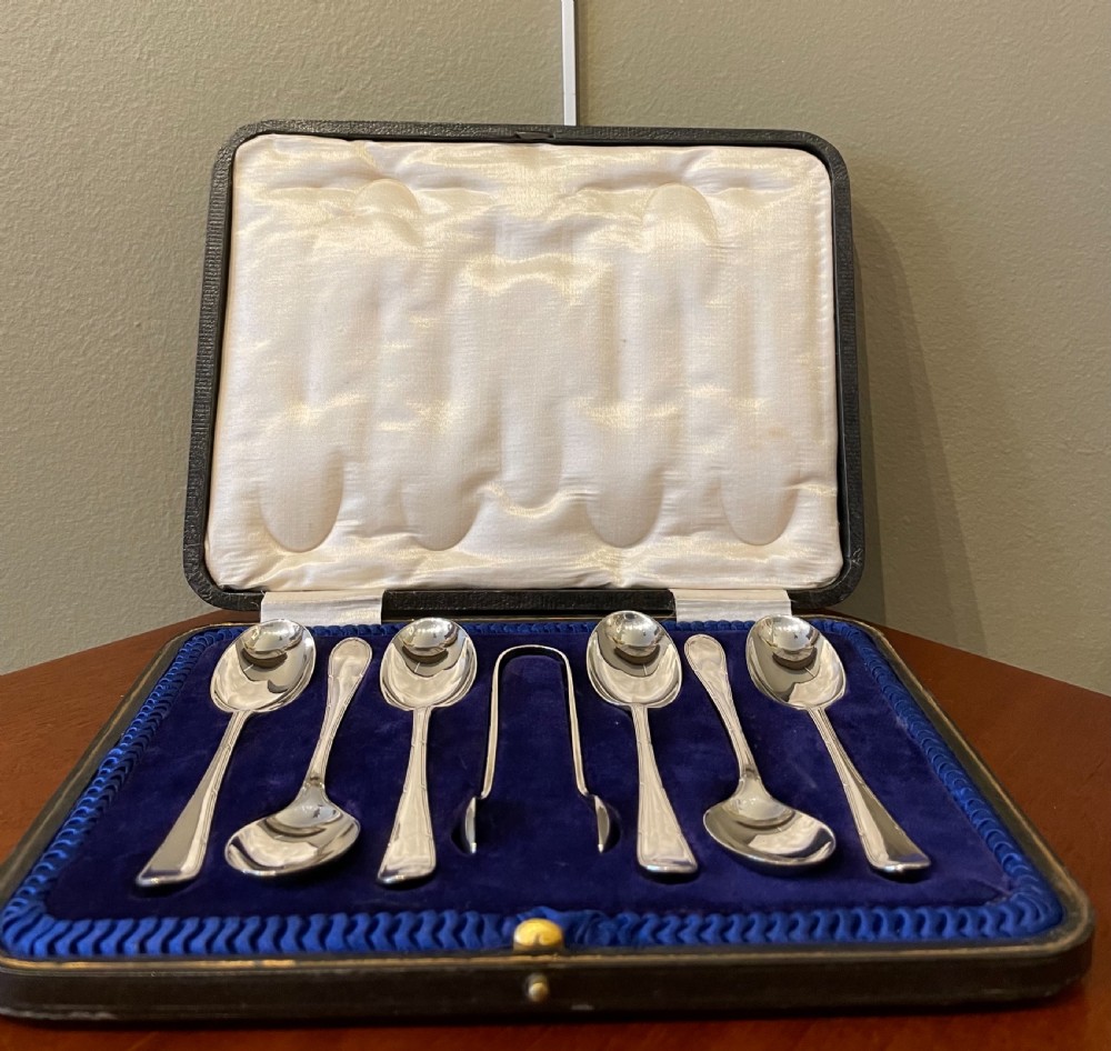 A good set of George V solid silver teaspoons and tongs  View II