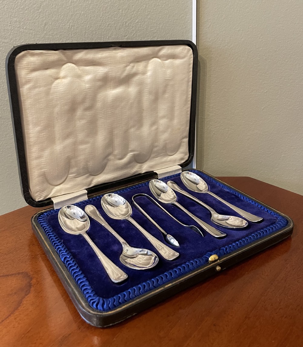 A good set of George V solid silver teaspoons and tongs  View III