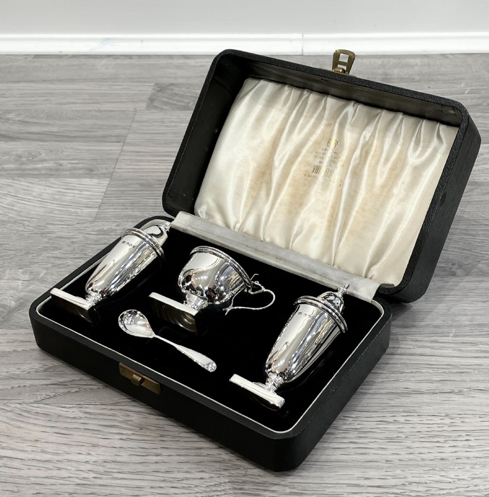 Elizabeth II Solid Silver Three Piece Cruet Set, cased.