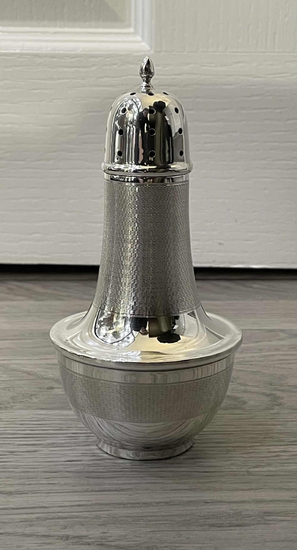 Stylish Art Deco Silver Sugar Caster by Joseph Gloster Ltd, with patent number 325841. Hallmarked Birmingham 1934.