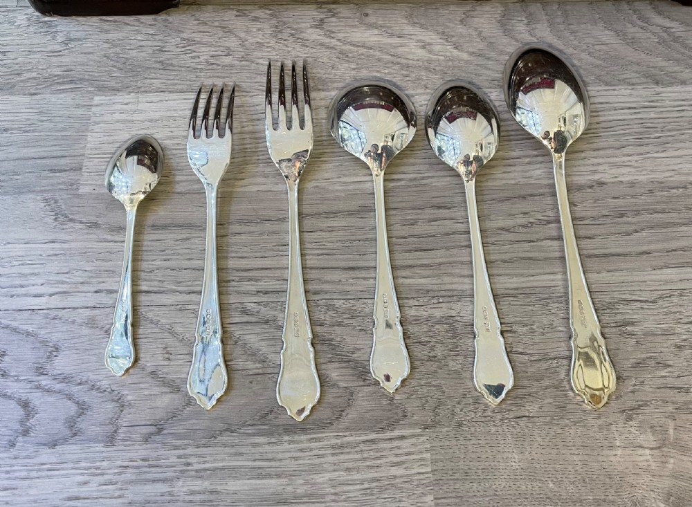 Solid Silver Canteen for Eight Persons, by Walker & Hall View VI