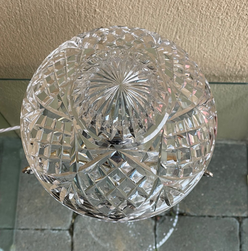 A clear cut crystal mushroom table lamp featuring diamond-patterned facets on the domed shade and a matching central stem. View III