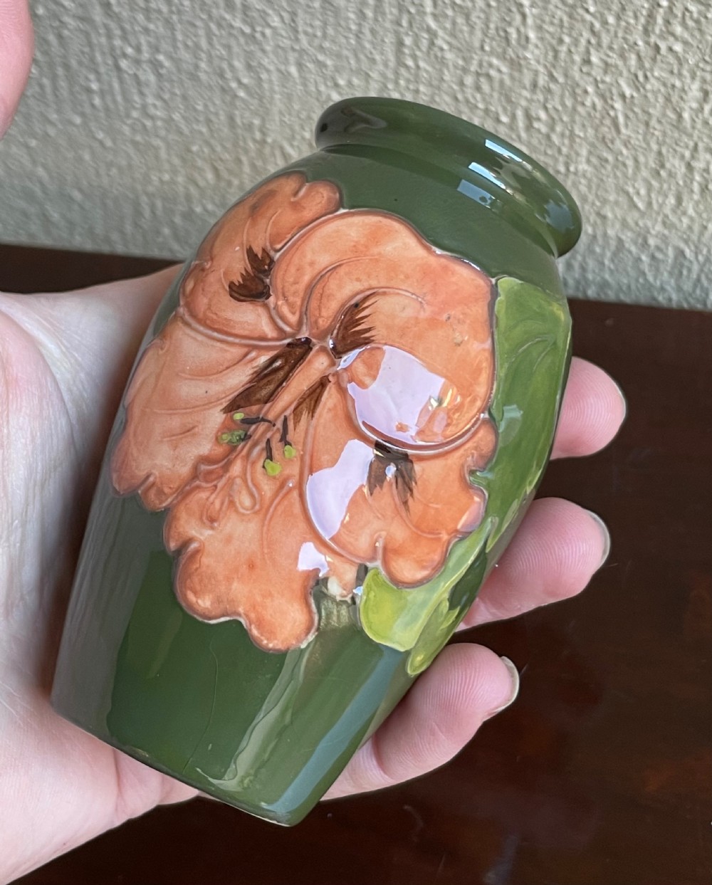 Moorcroft Coral Hibiscus Vase on Olive Green Background View III