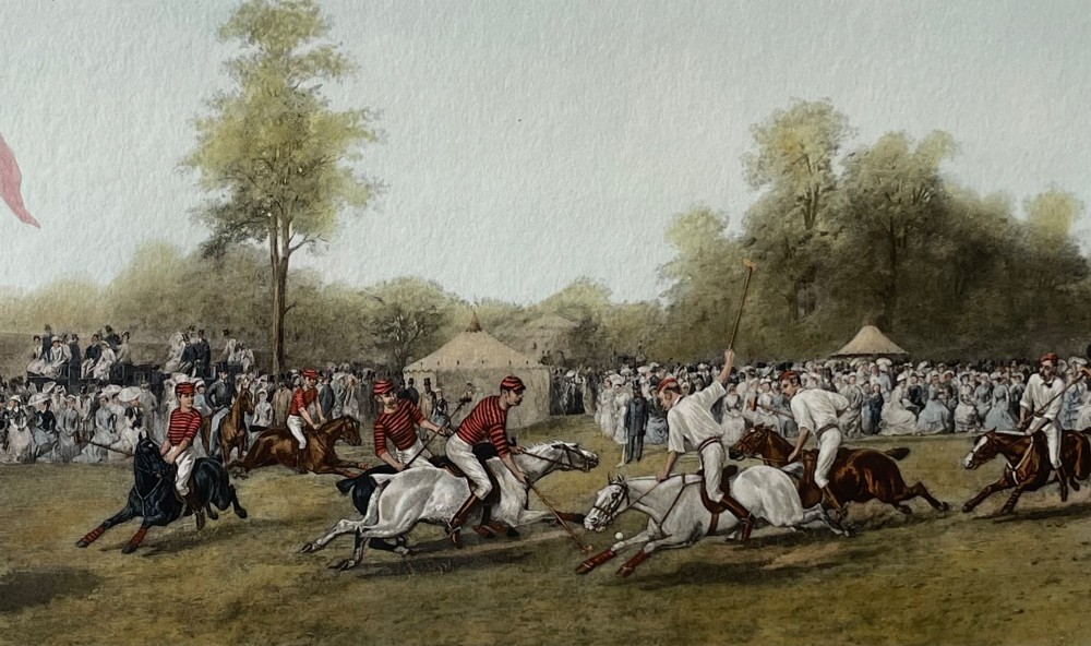 A framed nineteenth-century coloured lithograph depicting a polo match at Hurlingham with riders on horseback and spectators surrounding a green field, presented in a double mount and metallic frame. View III