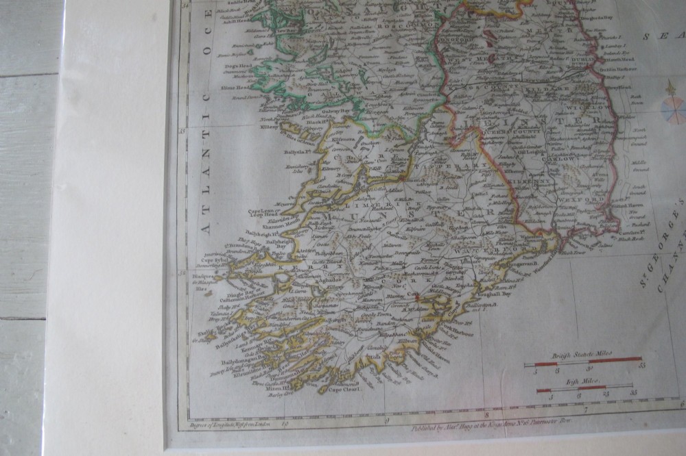 An eighteenth-century hand-coloured engraved map of Ireland presented within a broad off-white card mount. View V