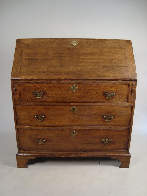 an 18th century bureau - CATEGORY: ANTIQUE BUREAU - DATED 1750