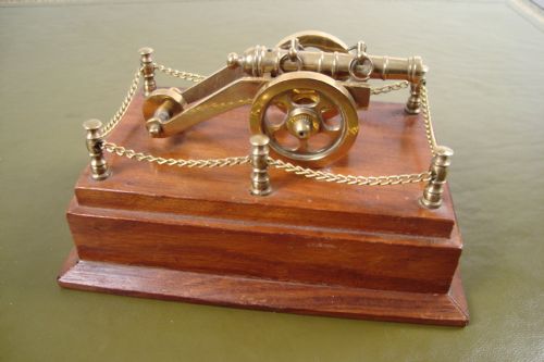 a decorative cannon on plinth - CATEGORY: ANTIQUE MISCELLANEOUS - DATED 1930