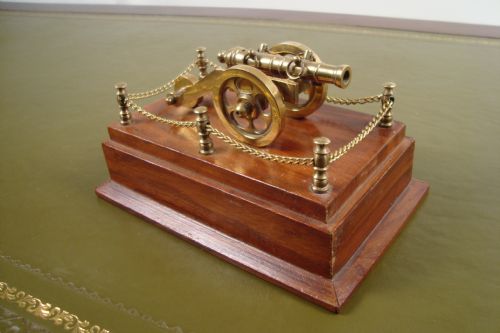 A DECORATIVE CANNON ON PLINTH - ADDITIONAL PHOTO 1