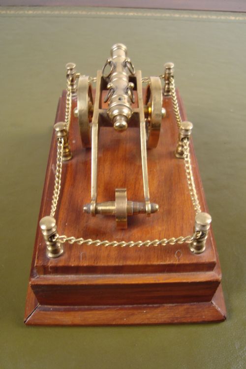 A DECORATIVE CANNON ON PLINTH - ADDITIONAL PHOTO 3