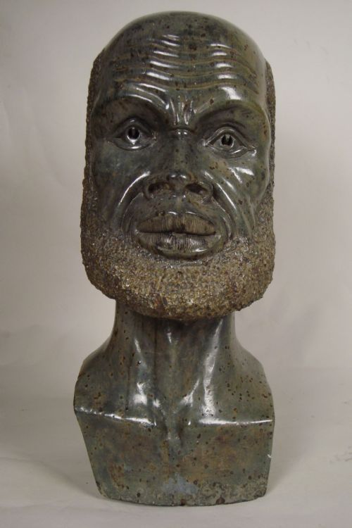 A LARGE 1930'S STATUE OF AN AFRICAN MAN - ADDITIONAL PHOTO 1