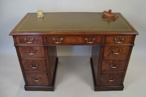 a fabulous mahogany twin pedestal desk - CATEGORY: ANTIQUE DESKS - DATED 1920
