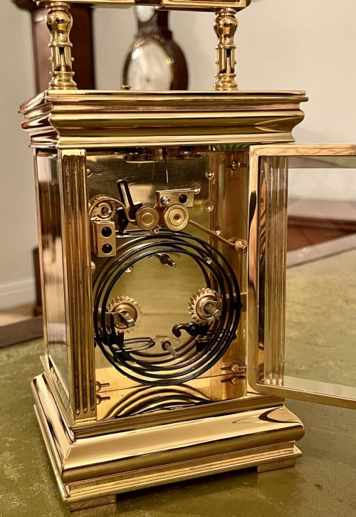 fig 1. French carriage clock with elaborate gilt case