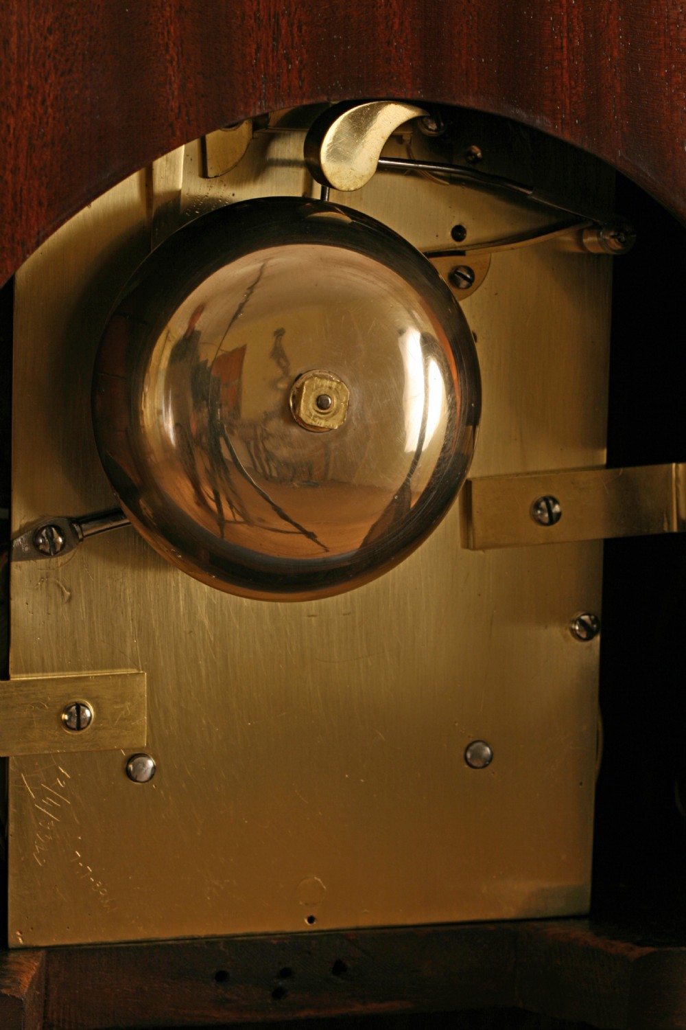 A Regency gothic arch mahogany bracket clock with brass lion mask side handles and a white dial inscribed Mitchell and Russell Glasgow. View VI
