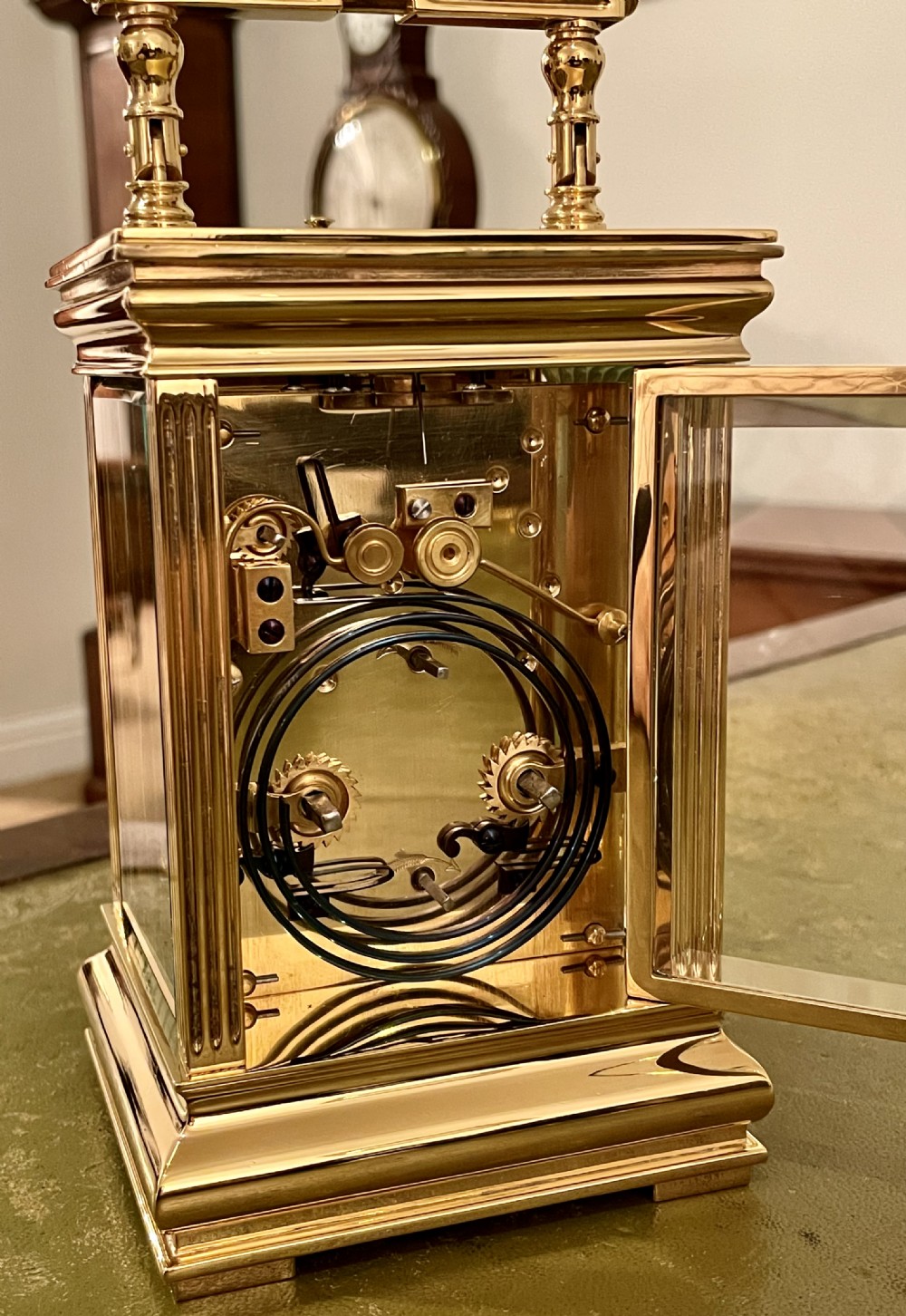 French carriage clock with elaborate gilt case View II