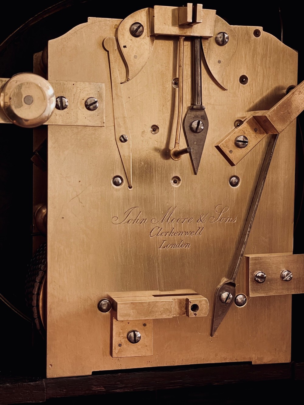 Chamfer top bracket clock by Moore & Sons of London View V