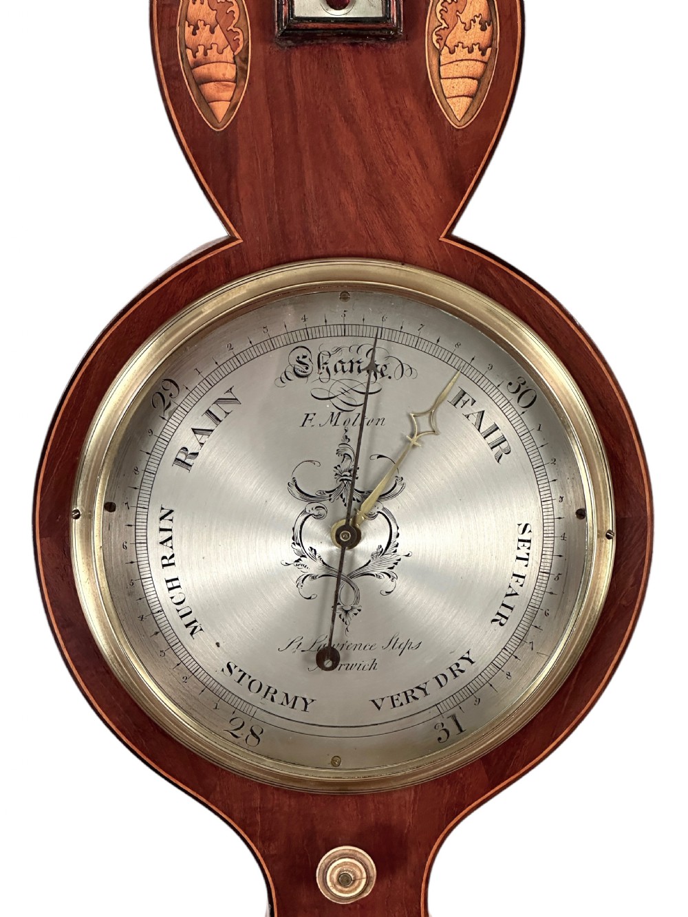 An antique banjo-shaped mahogany wheel barometer featuring shell marquetry inlays, a silvered glass thermometer tube, and an engraved round brass dial. View II
