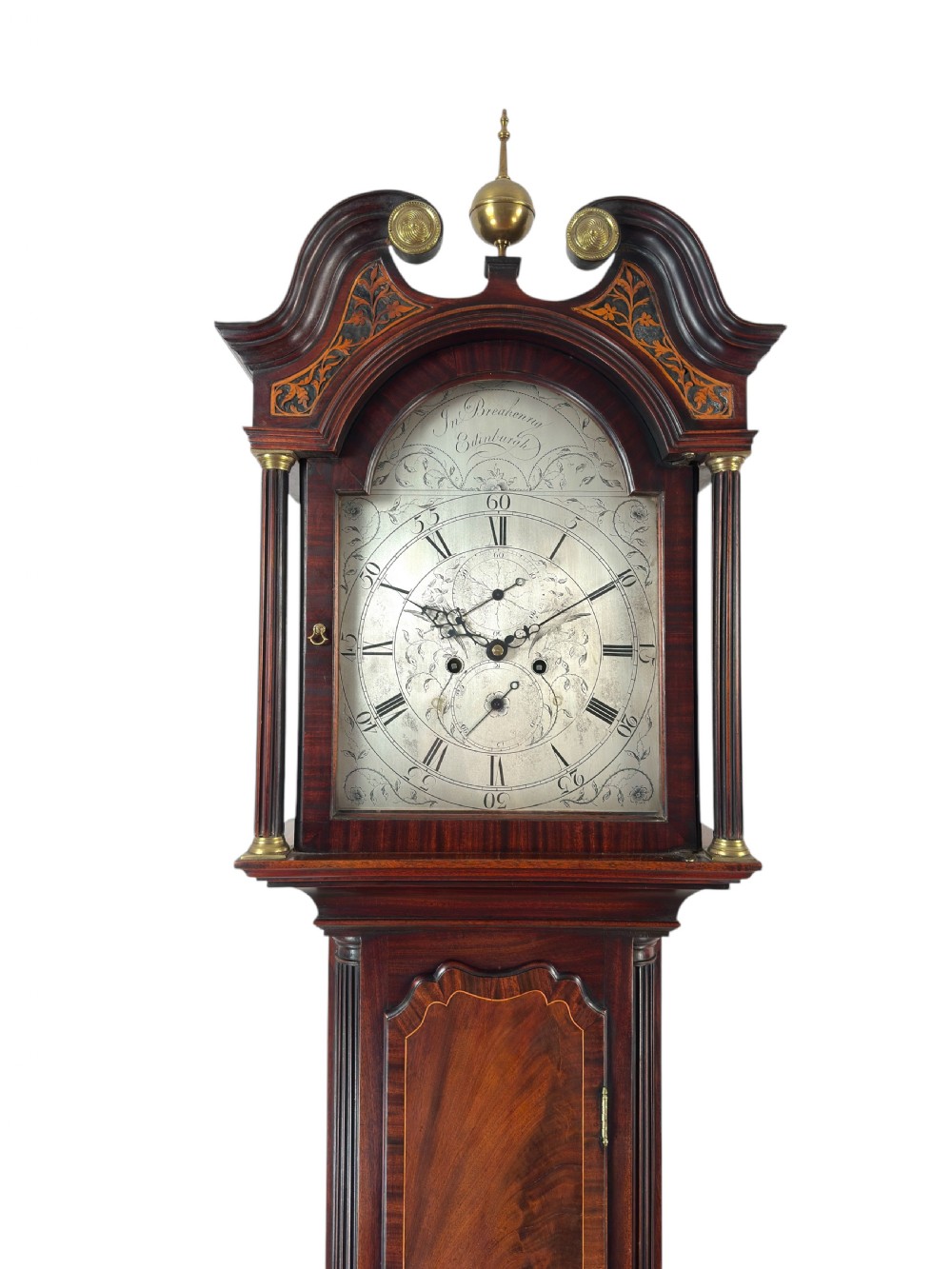 A Scottish Georgian flame mahogany longcase clock featuring a swan-neck pediment, fluted quarter columns, and an engraved arched dial signed by John Breakenrig of Edinburgh. View II