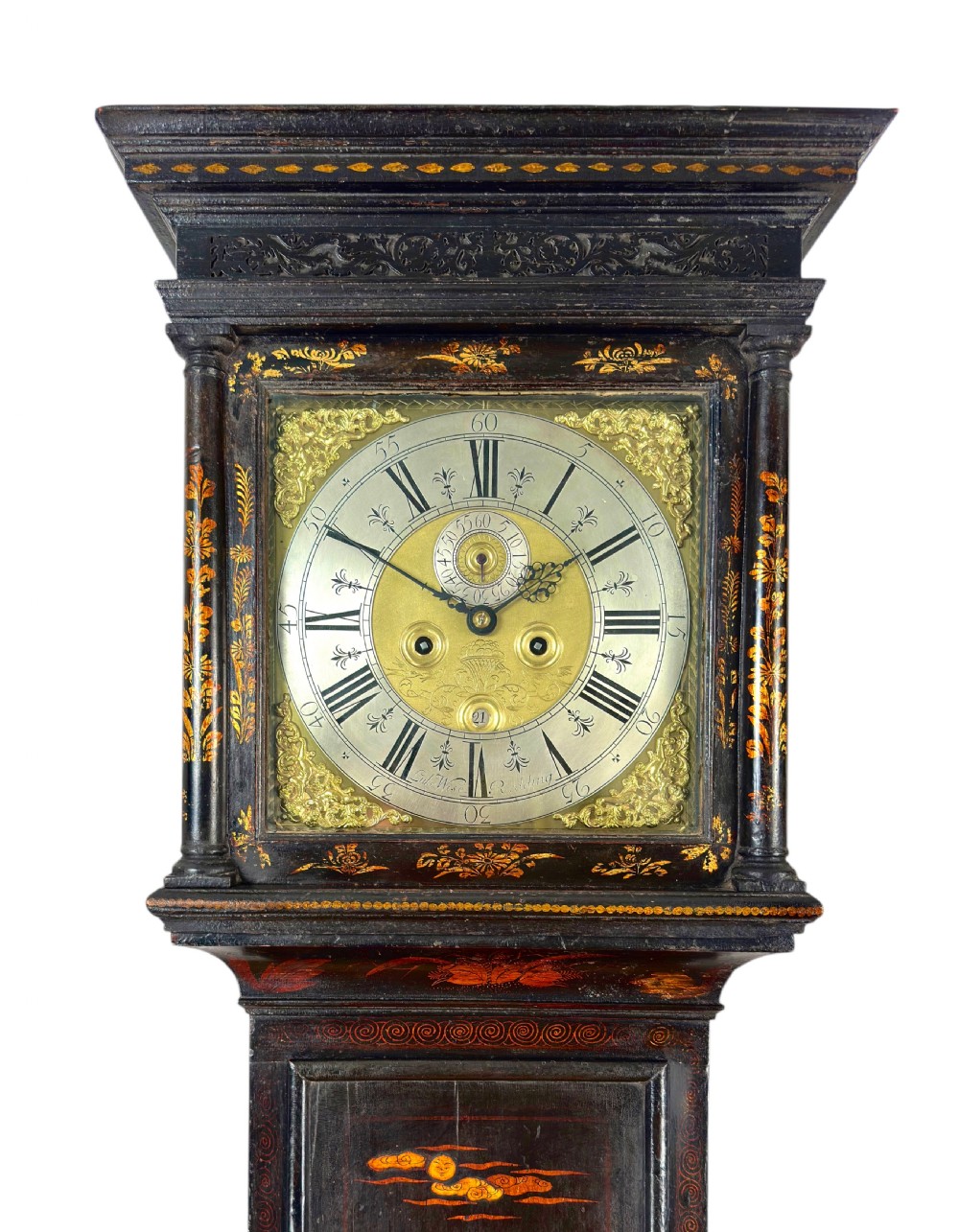 A tall, black lacquered longcase clock decorated with gold Chinoiserie landscapes, featuring a square brass dial with Roman numerals. View II