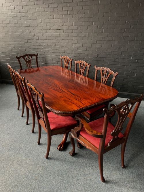 a chippendale style twin pedestal table eight conforming chairs - CATEGORY: ANTIQUE CHAIRS - DATED 1930