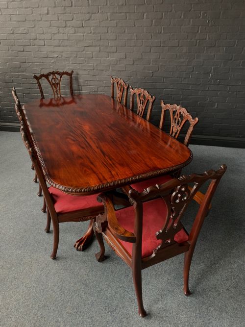 A CHIPPENDALE STYLE TWIN PEDESTAL TABLE EIGHT CONFORMING CHAIRS - ADDITIONAL PHOTO 2