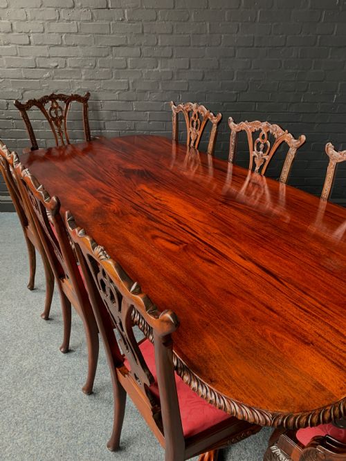 A CHIPPENDALE STYLE TWIN PEDESTAL TABLE EIGHT CONFORMING CHAIRS - ADDITIONAL PHOTO 4